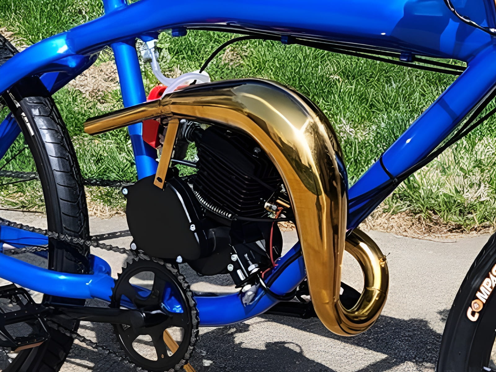 Zeda ZDX65 Gold Exhaust on Blue Bike